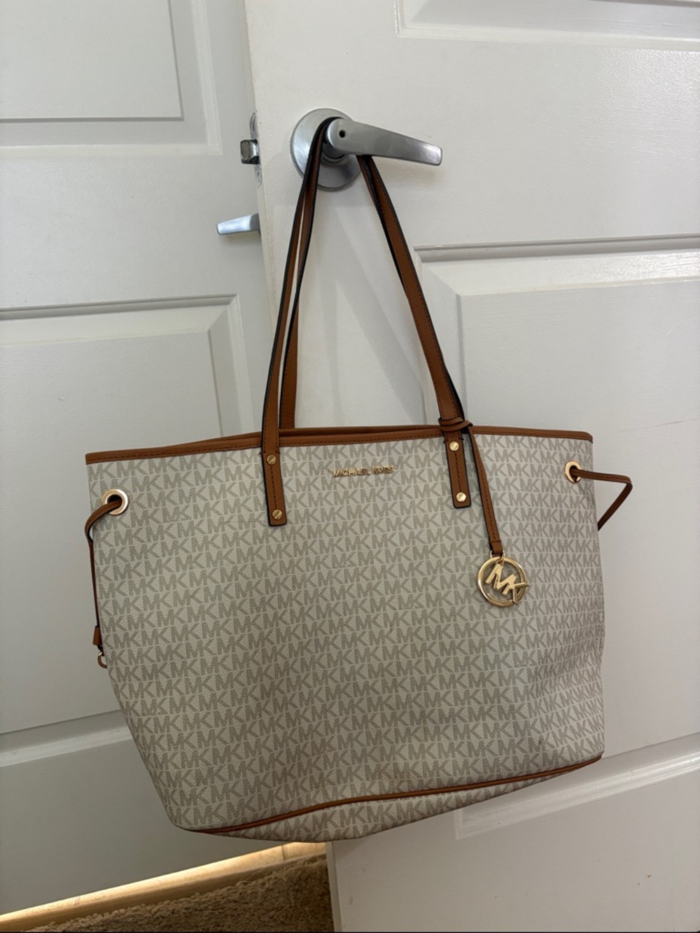 Michael Kors Cream Logo Tote with Brown Trim and Gold Charm